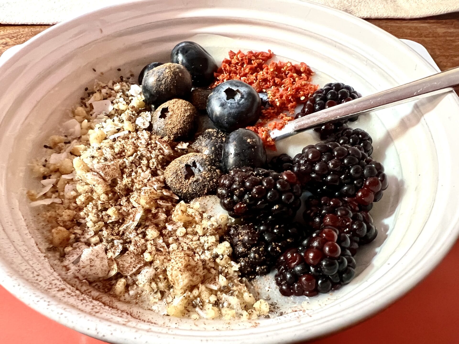 A go-to breakfast bowl with oatmeal, berries, and granola.