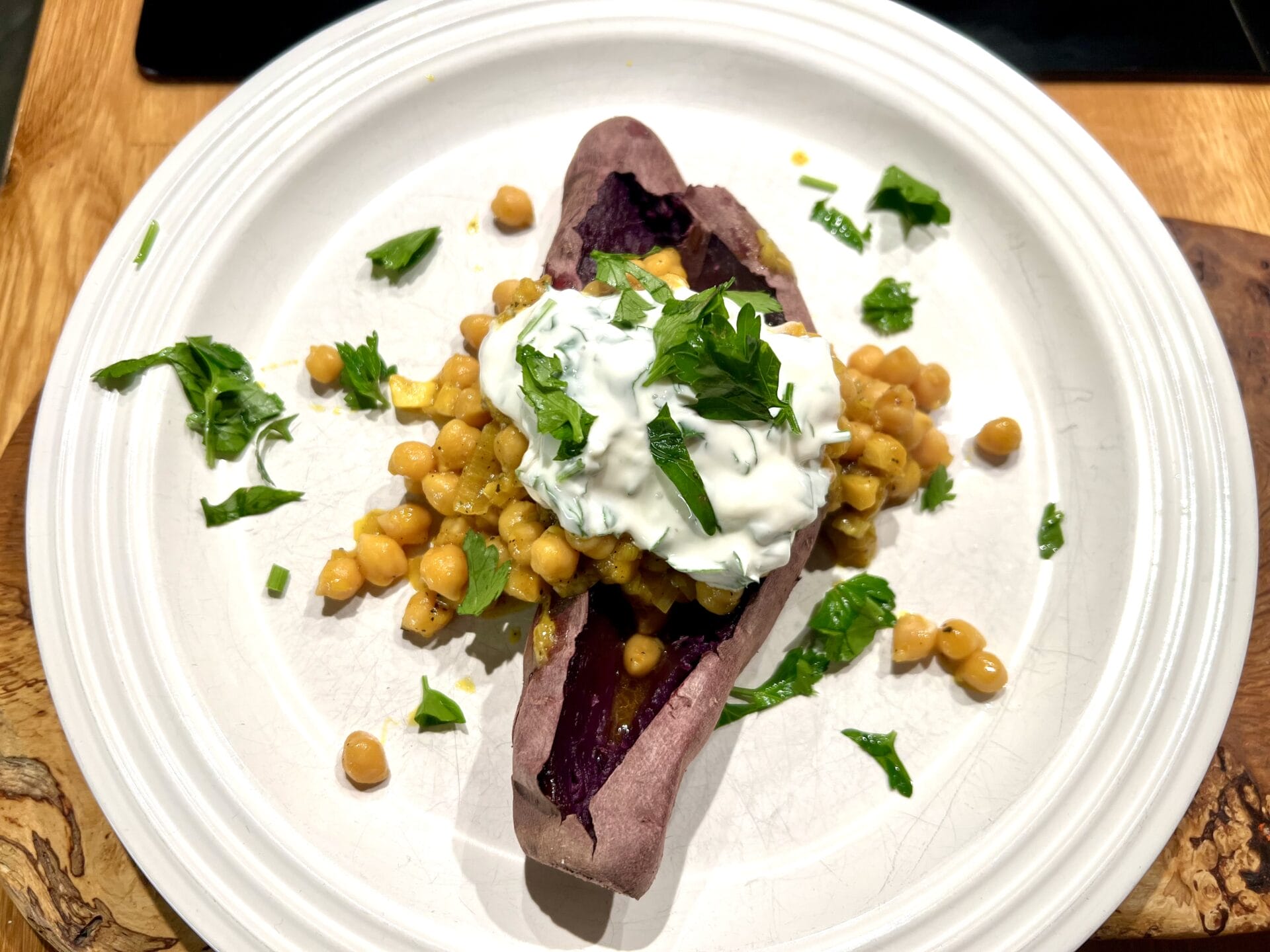 Baked purple potatoe with turmeric chickpeas and yoghurt: Eating for Longevity.
